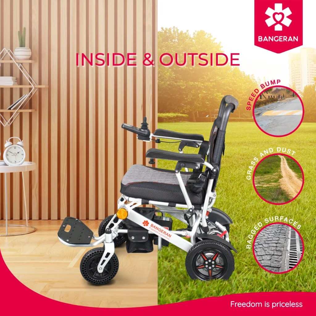 Side view of Bangeran Pegasus foldable electric wheelchair showing that it works indoors and outdoors on speed bumps grass and rough surfaces.