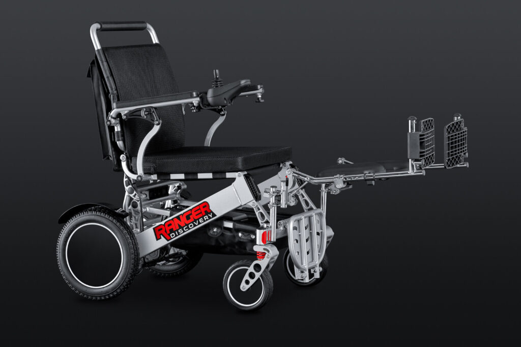 Porto Mobility Ranger Discovery folding power wheelchair with leg rest attachment extended forward