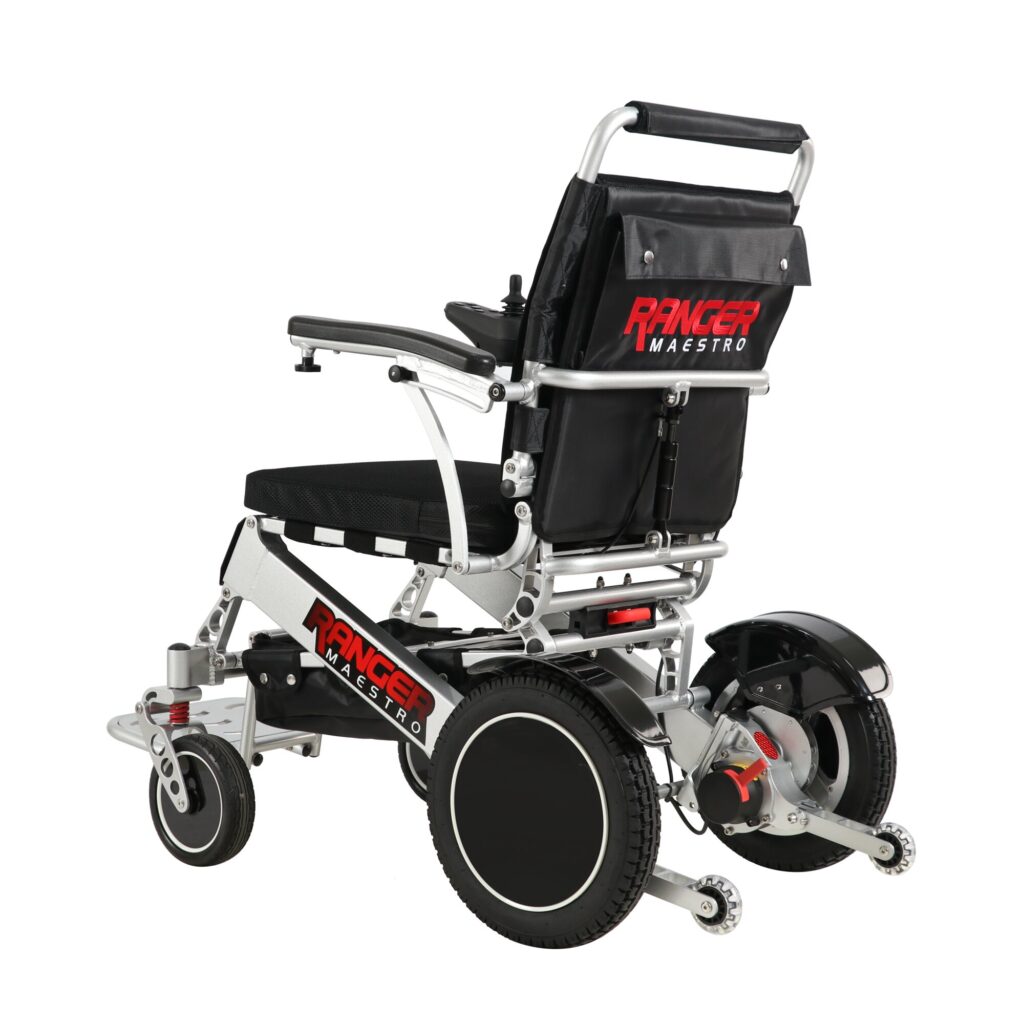 Porto Mobility Ranger Maestro reclining folding power wheelchair, angled rear view from the left