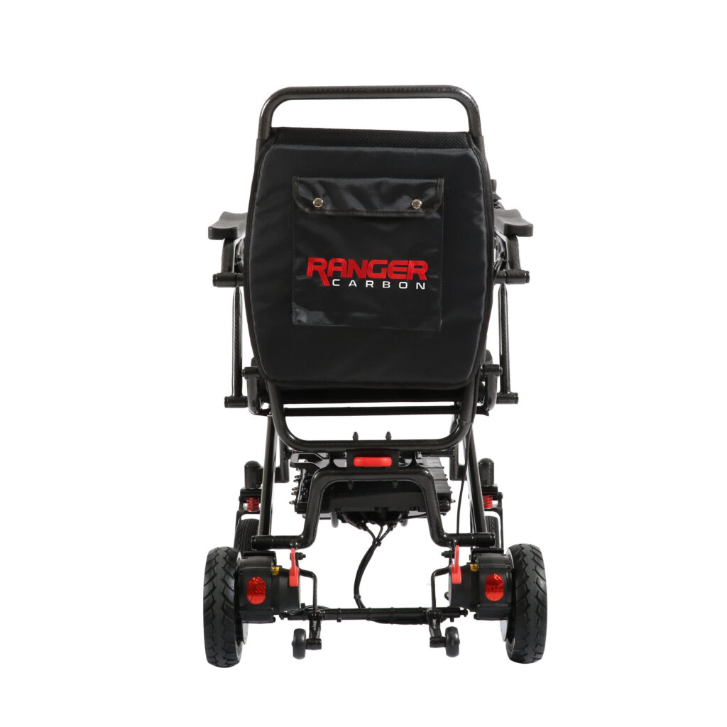 Porto Mobility Ranger Carbon folding power wheelchair, rear view with backrest pouch
