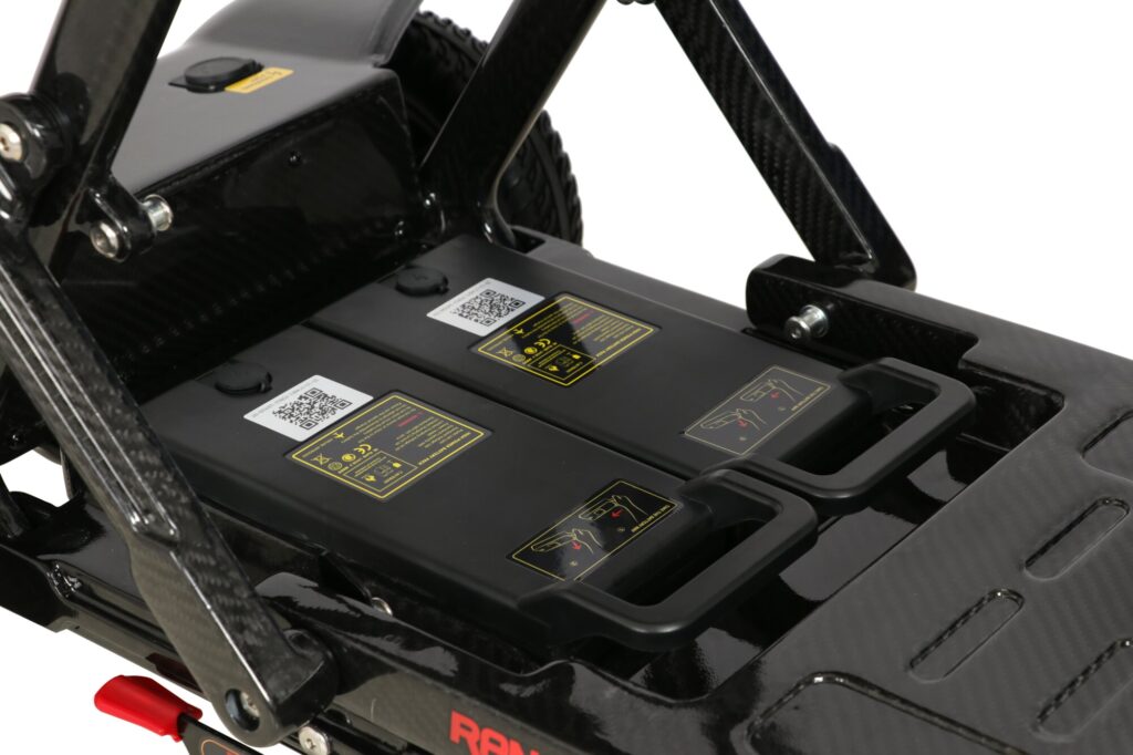 Porto Mobility Ranger Ivy folding scooter, close up of two battery packs with carry handles in the deck